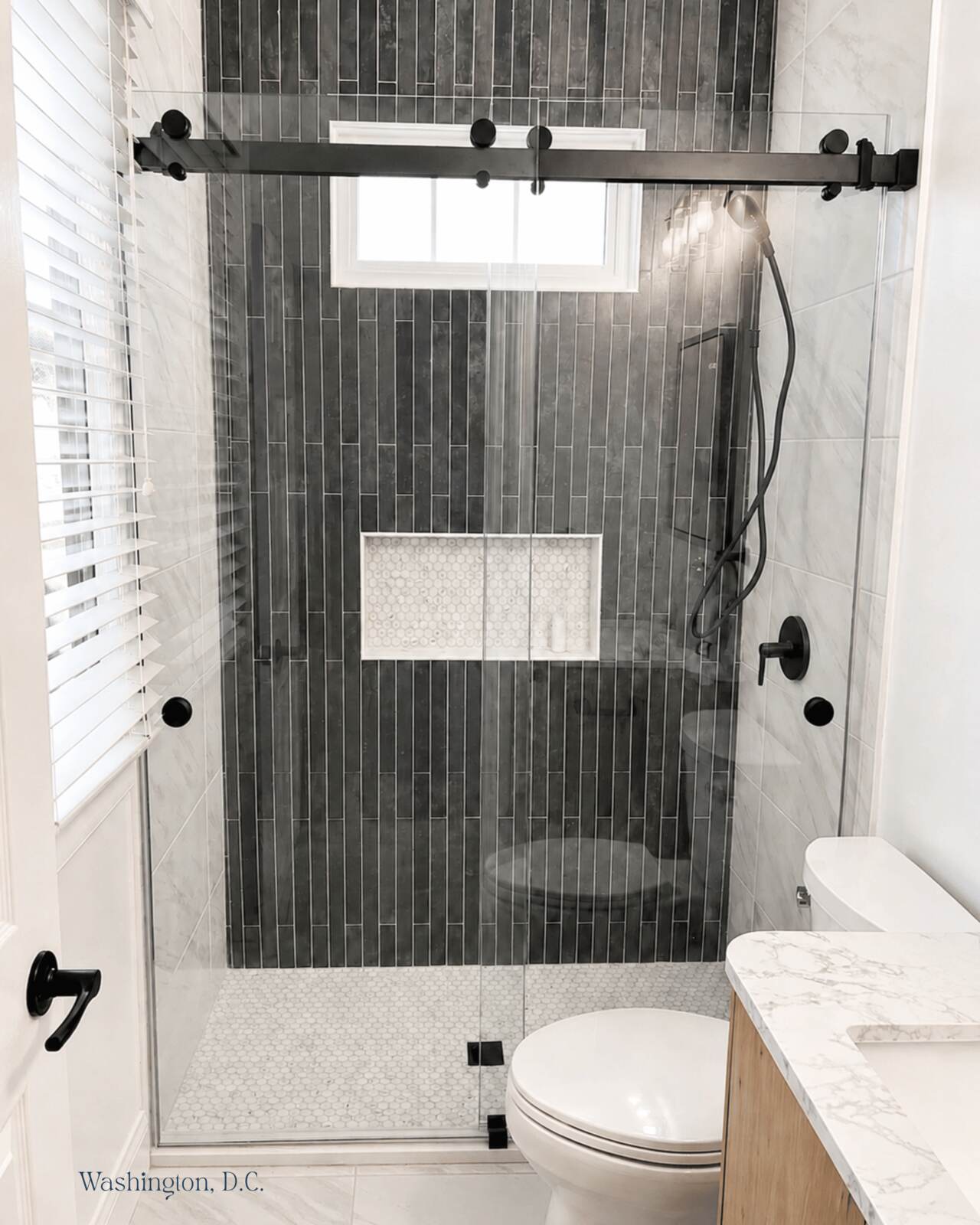 Frameless glass shower enclosure
