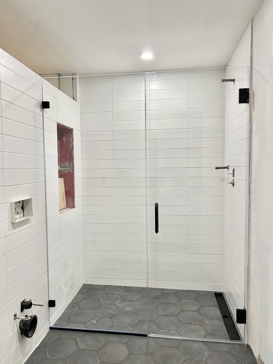 Frameless glass shower enclosure in H Street, Dupont Circle, DC