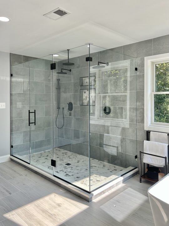 Frameless glass shower enclosure in Davidsonville, Crofton, MD