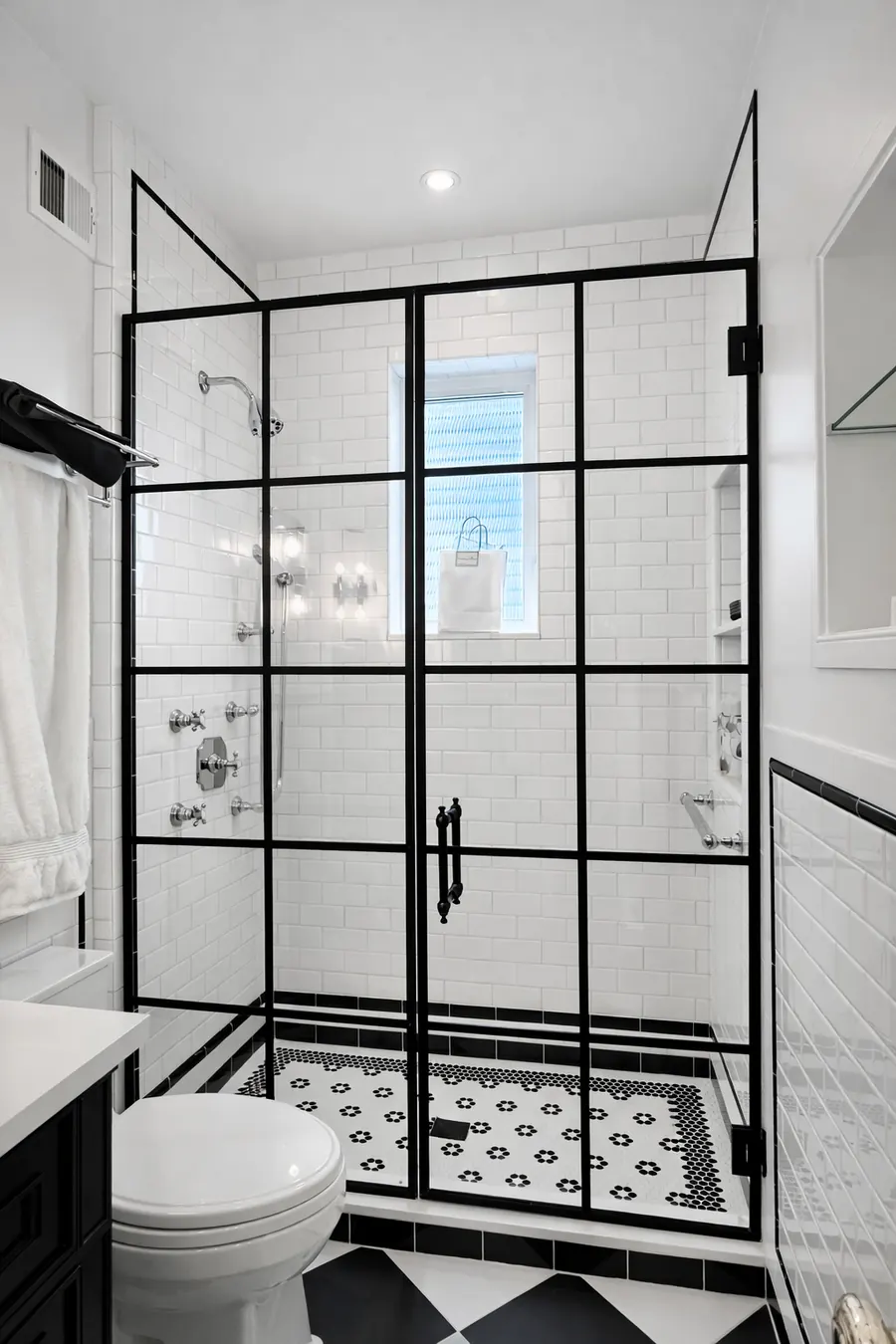 Grid shower door, matte black hardware, door and panel