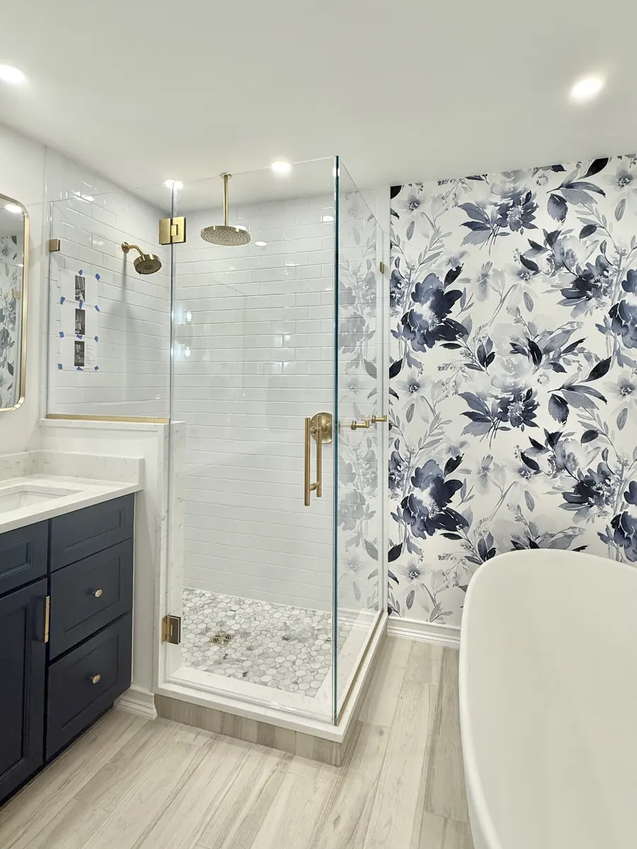 90 degree corner frameless glass shower enclosure, satin brass hardware, rain shower, 90 degree corner glass shower door