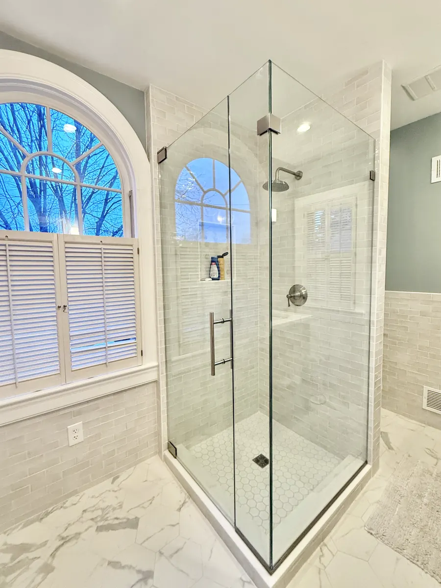 90 degree corner frameless glass shower enclosure, polished chrome hardware, ladder