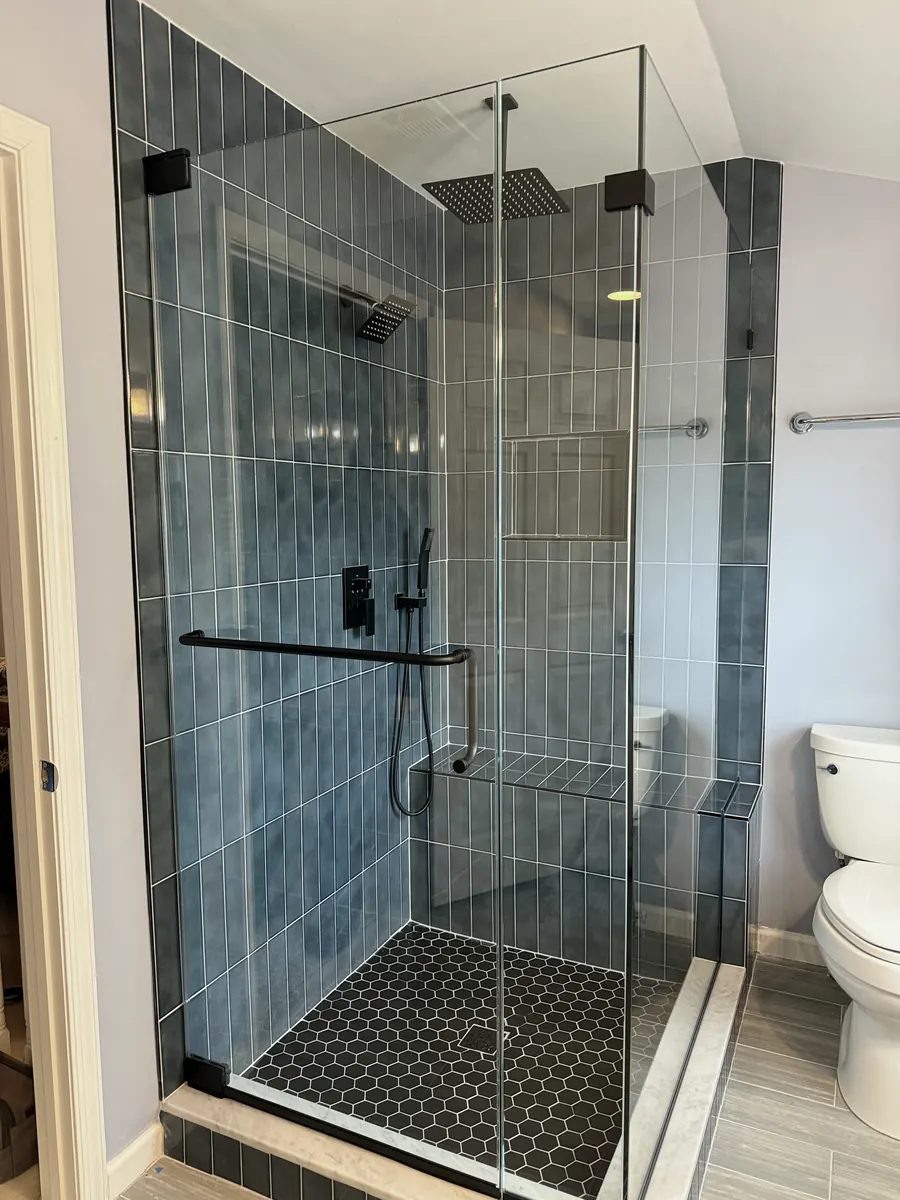 90 degree corner frameless glass shower enclosure, matte black hardware, combo handle