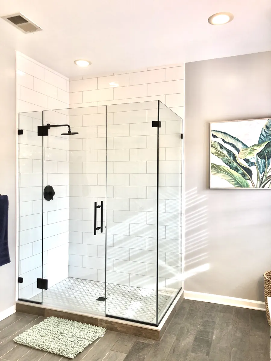 90 degree corner frameless glass shower enclosure, matte black hardware, Frameless Panel-Door-Panel-Return with Matte Black Hardware