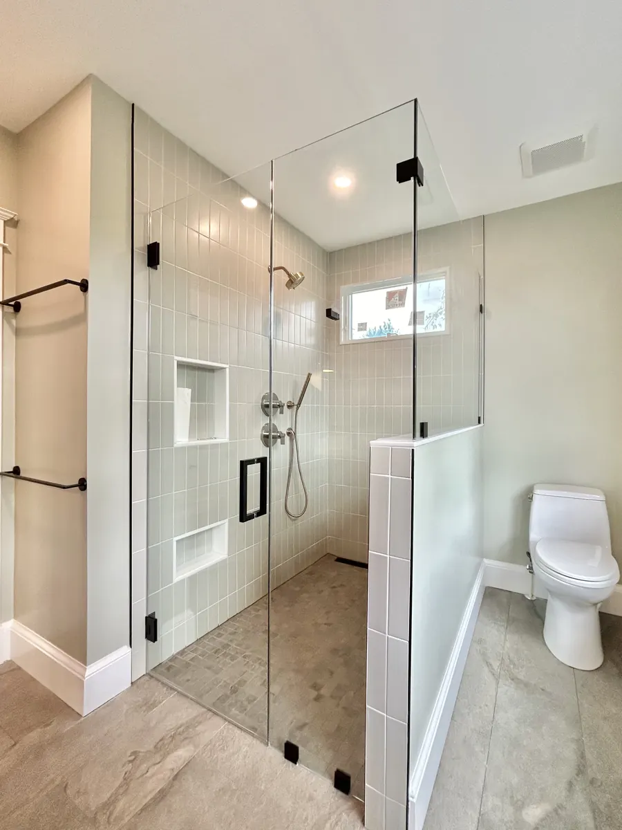 90 degree corner frameless glass shower enclosure, matte black hardware, Shower Door in Alexandria, Virginia