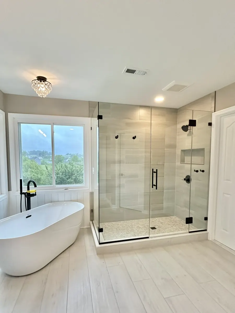 90 degree corner frameless glass shower enclosure, matte black hardware, Shower Door in Howard County