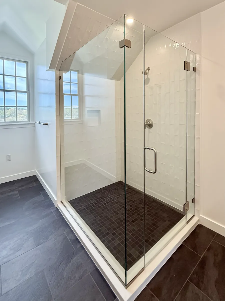 90 degree corner frameless glass shower enclosure, polished nickel hardware