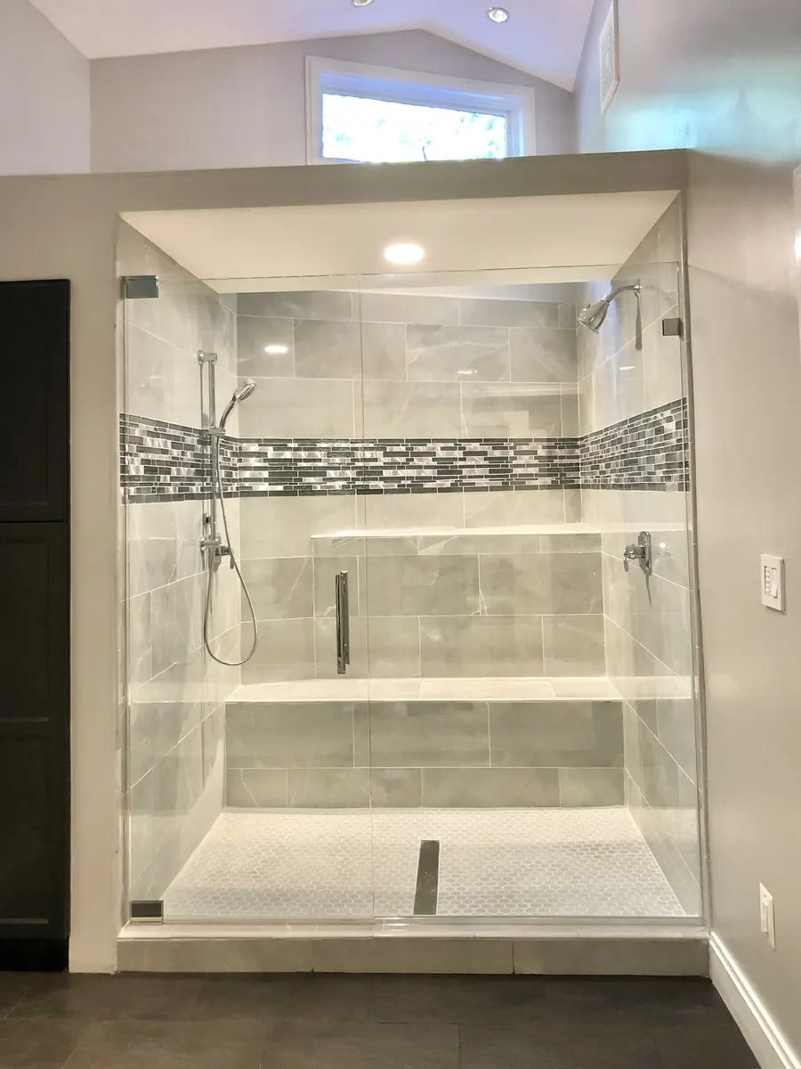 Door and panel frameless glass shower enclosure, polished chrome hardware, Frameless Shower Door in Bethesda