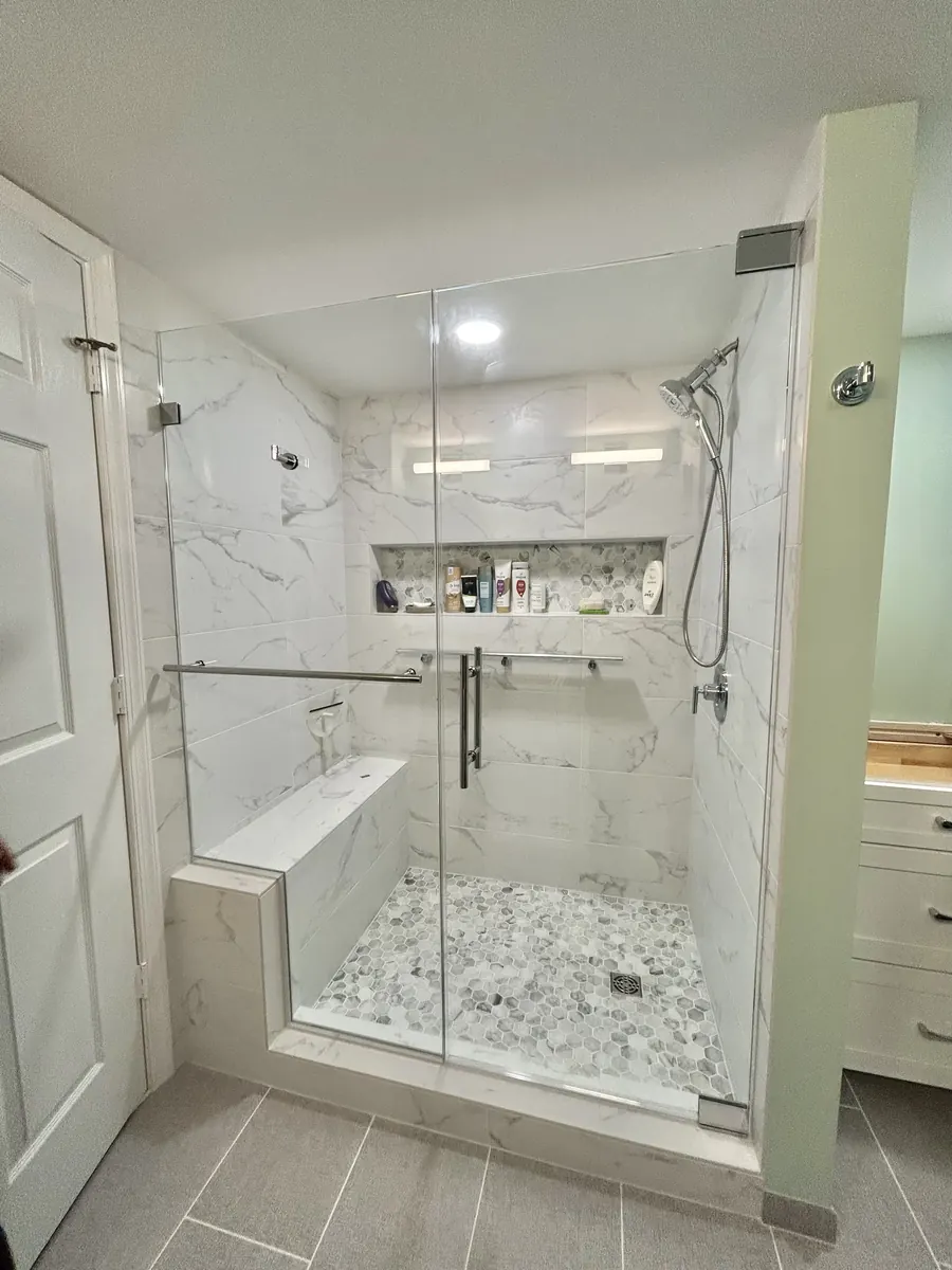 Door and panel frameless glass shower enclosure, polished chrome hardware, Shower Door in Alexandria Virginia