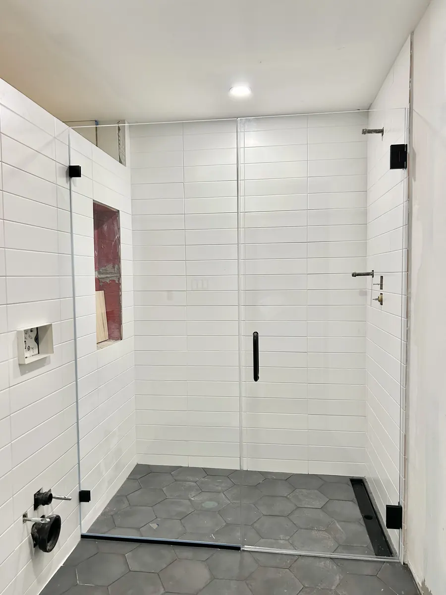 Door and panel frameless glass shower enclosure, matte black hardware, Shower Door IN Washington DC