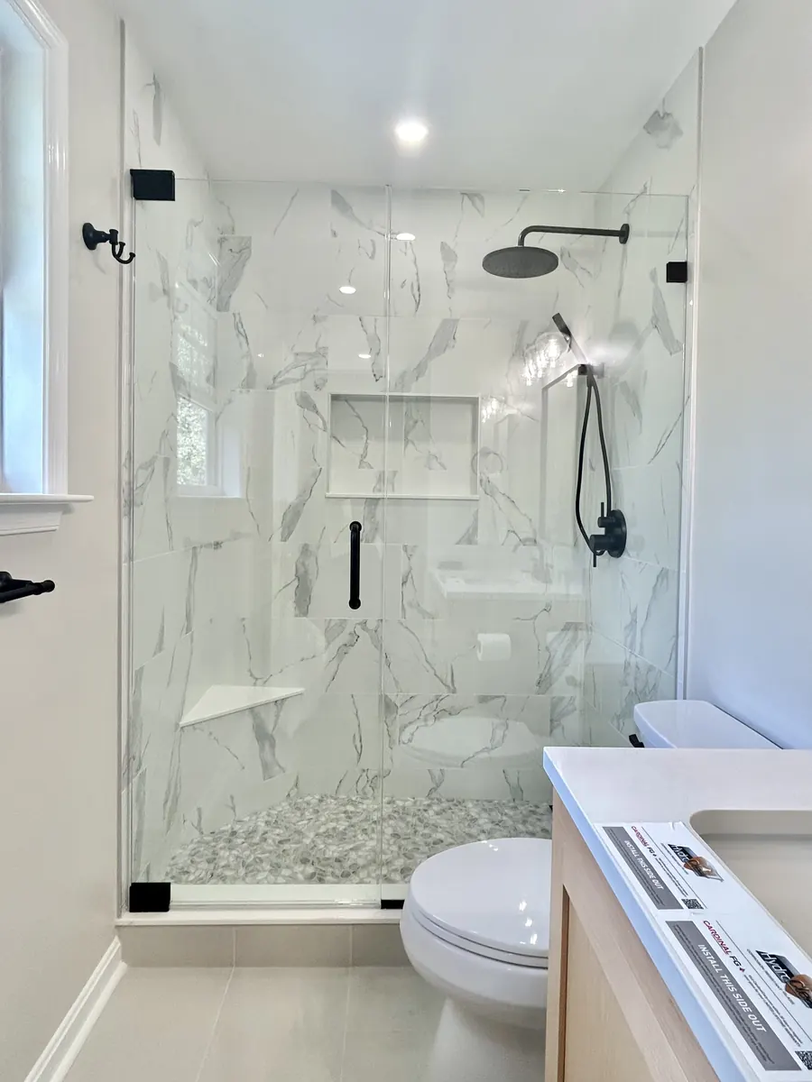Door and panel frameless glass shower enclosure, matte black hardware, Shower Door in Annapolis, Cape St Claire