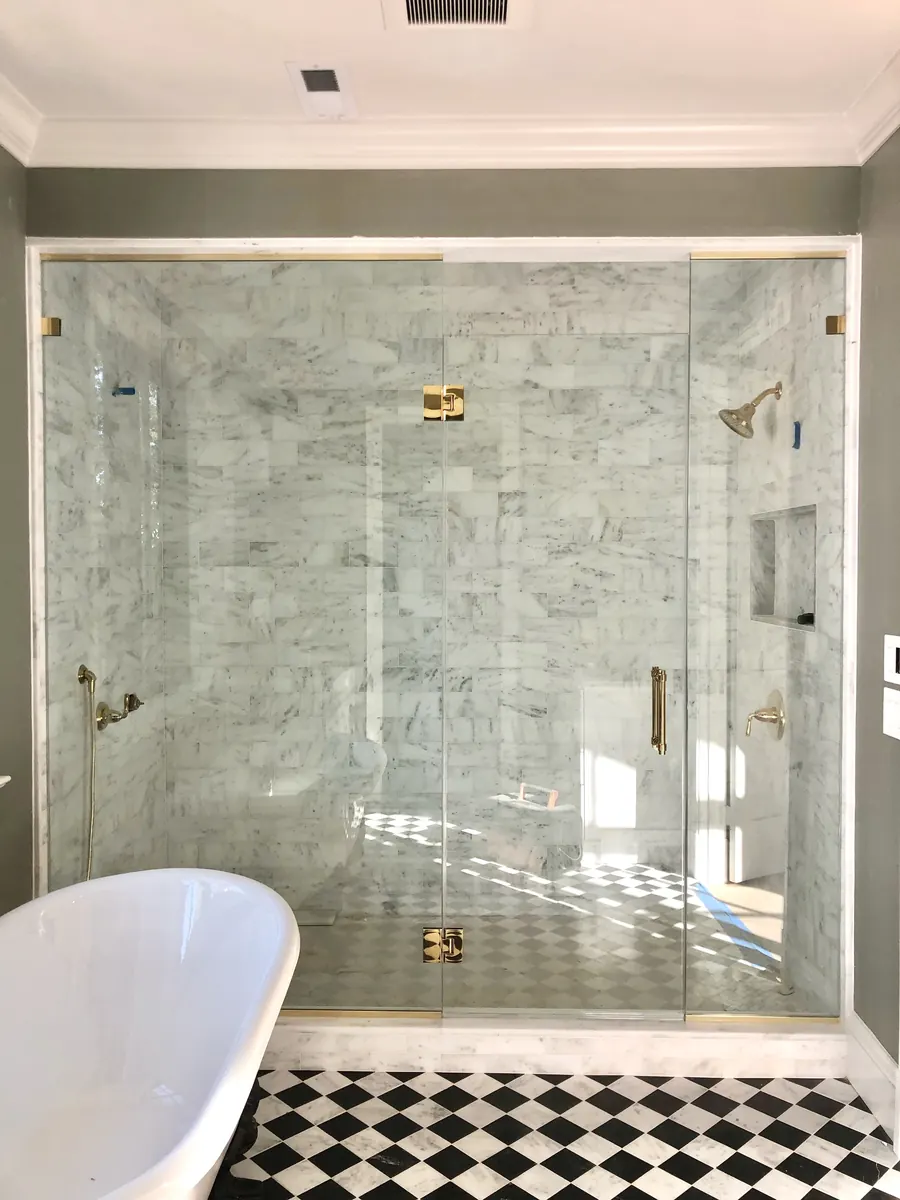 In-line panel frameless glass shower enclosure, satin brass hardware, Panel-Door-Panel Shower Door in Alexandria Virginia