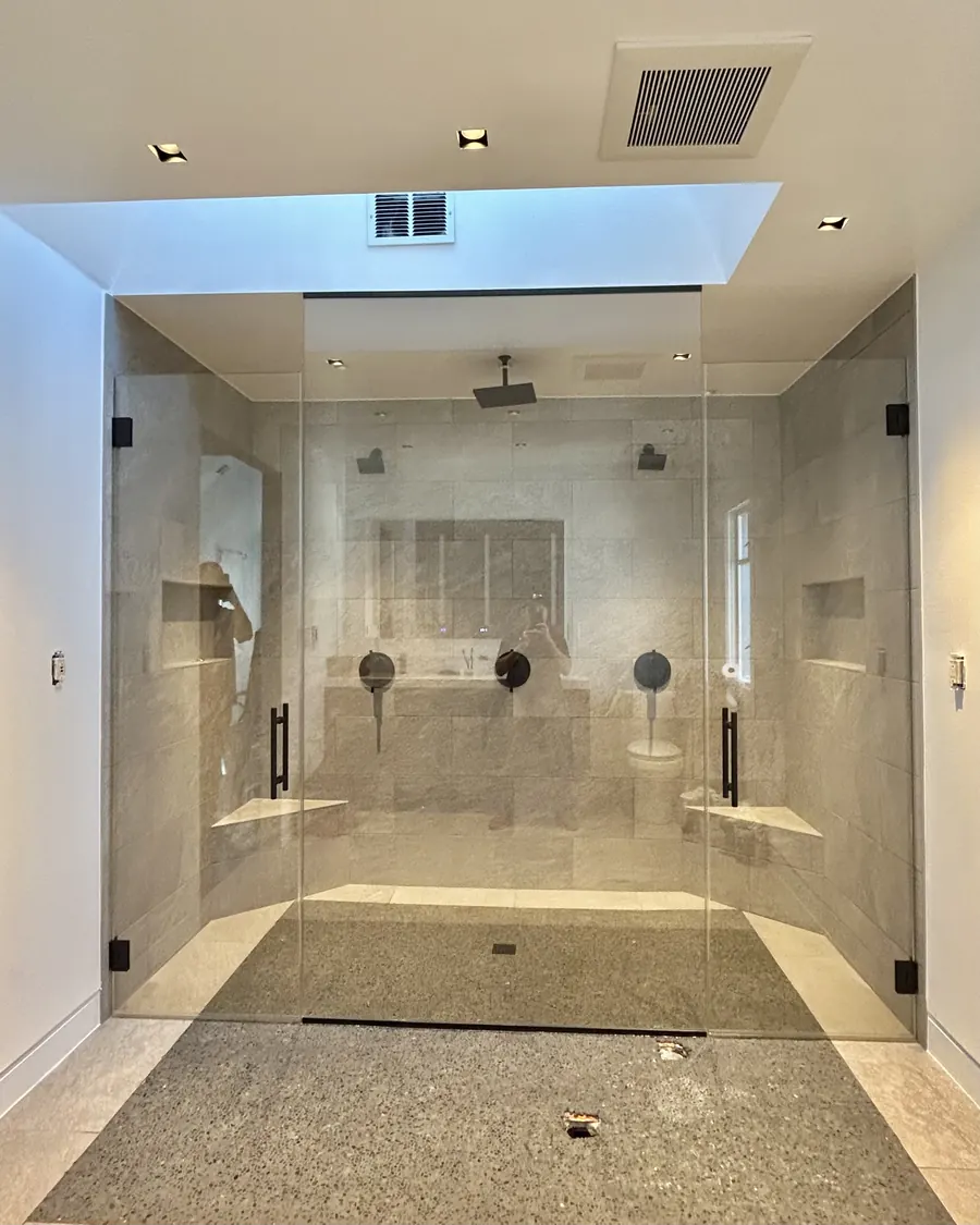 In-line panel frameless glass shower enclosure, matte black hardware, double doors with glass to ceiling, Shower Doors in Chevy Chase