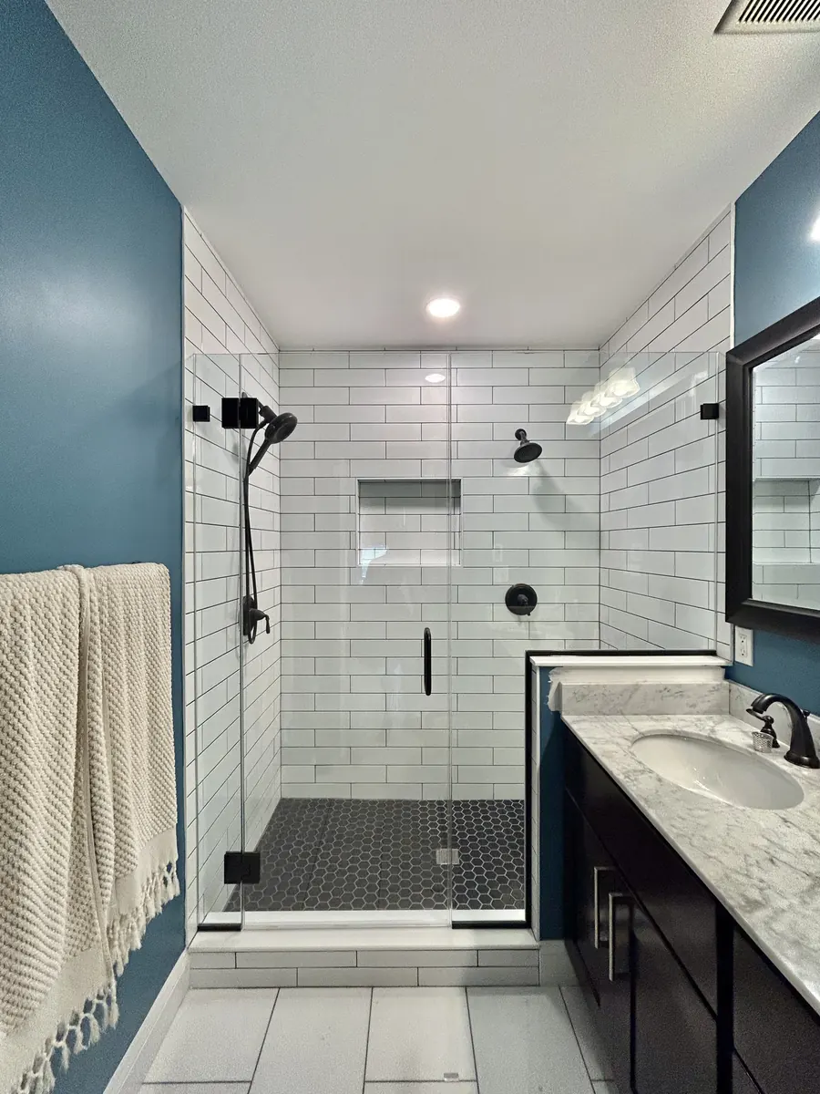 In-line panel frameless glass shower enclosure, matte black hardware, Shower Door in Damascus Maryland