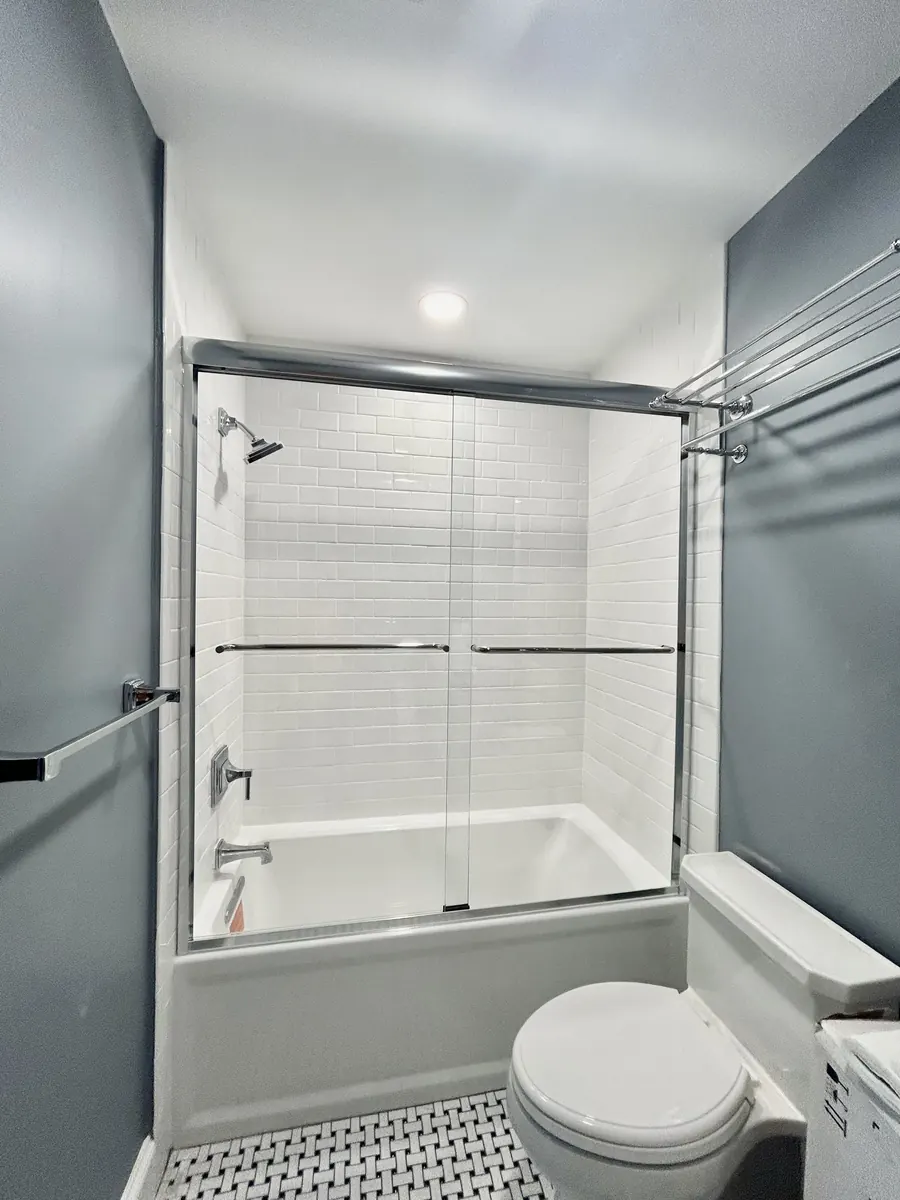 Frameless sliding shower door, over a tub, semi-frameless, Baltimore, Inn Harbor Tub Slider Shower Door