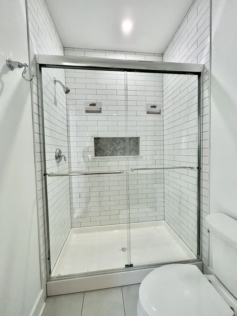 Frameless sliding shower door, polished chrome hardware, Semi-Frameless Legend Slider