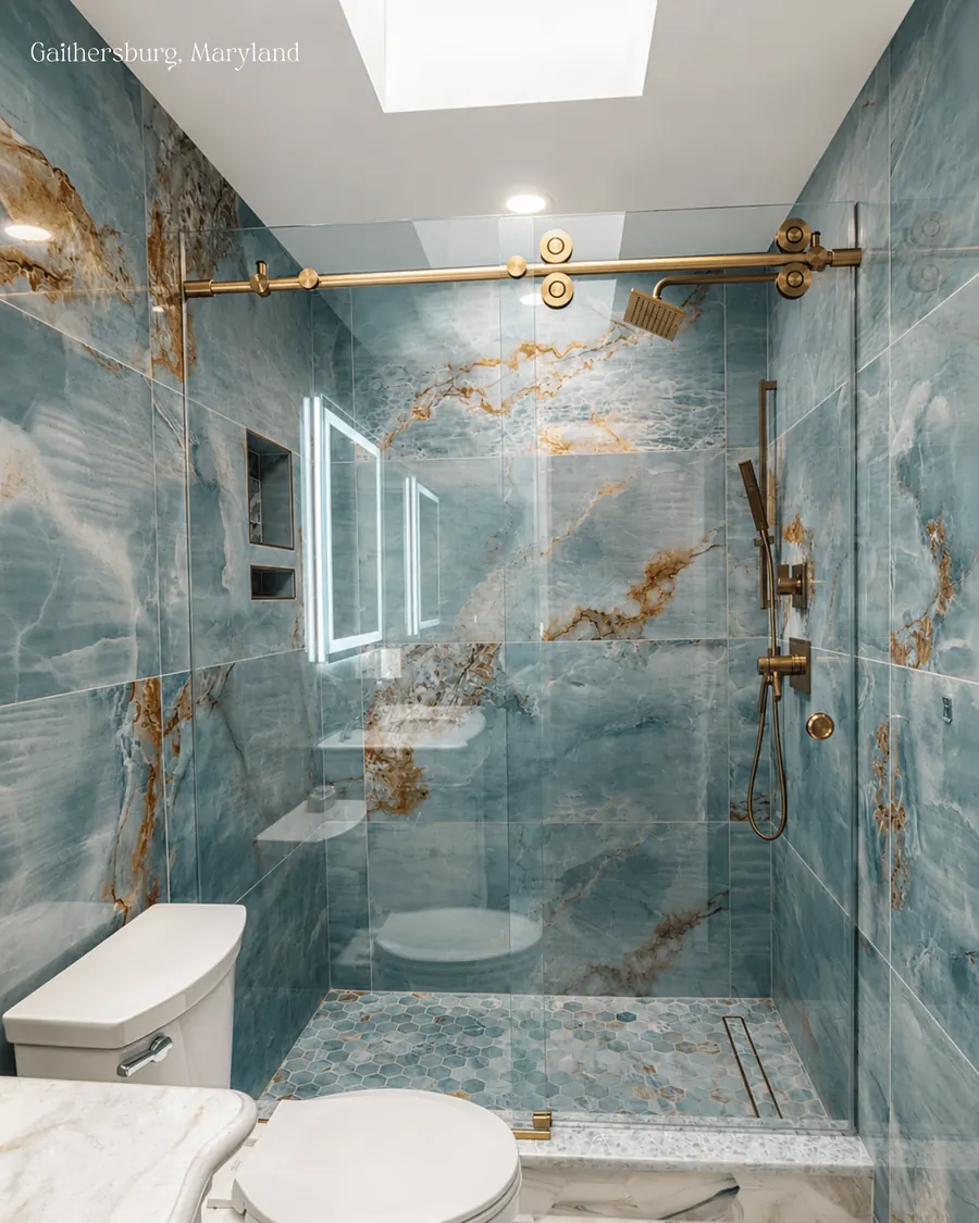 Titan series frameless sliding shower door, satin brass hardware
