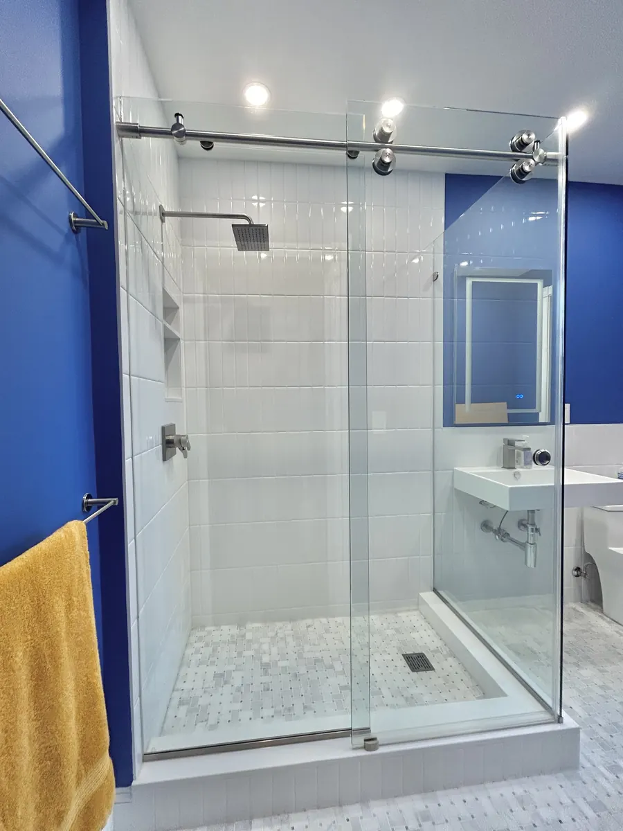Titan series frameless sliding shower door, polished chrome hardware, Dupont Circle, Frameless Sliding Door with 90 Degree Panel