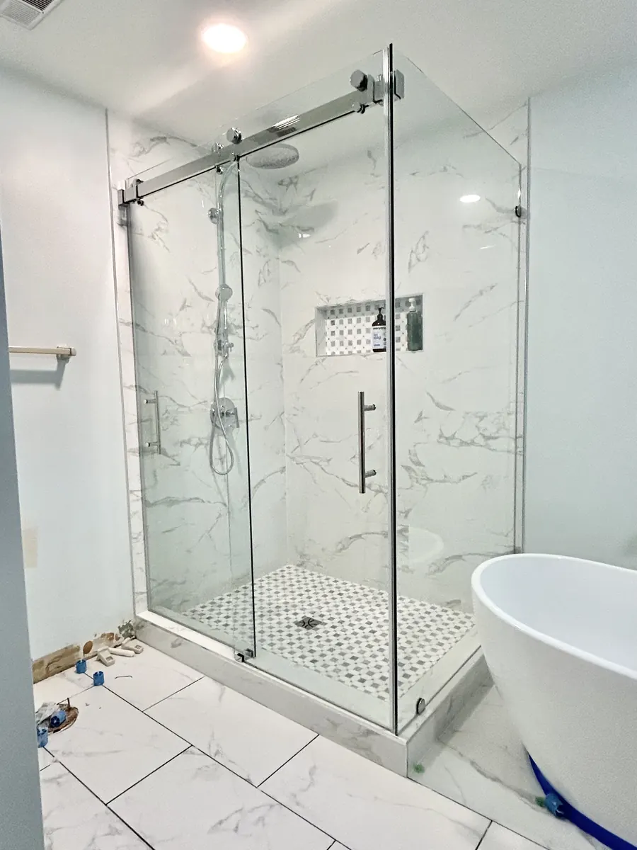 Titan Duo series frameless sliding shower door, with a 90 degree return panel, polished chrome hardware, Frameless Double Sliding Shower Door with 90 Degree Panel