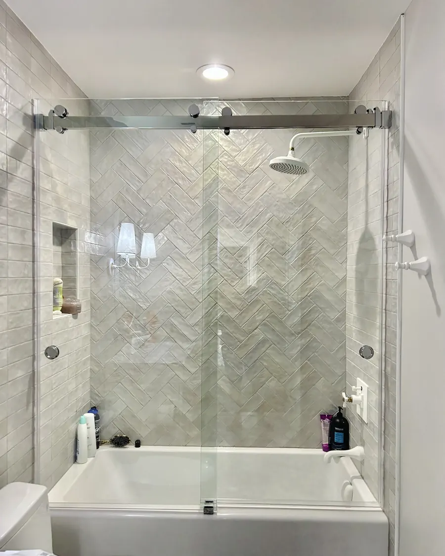 Titan Duo series frameless sliding shower door, polished chrome hardware, Double Sliding Frameless Shower Door in Olney