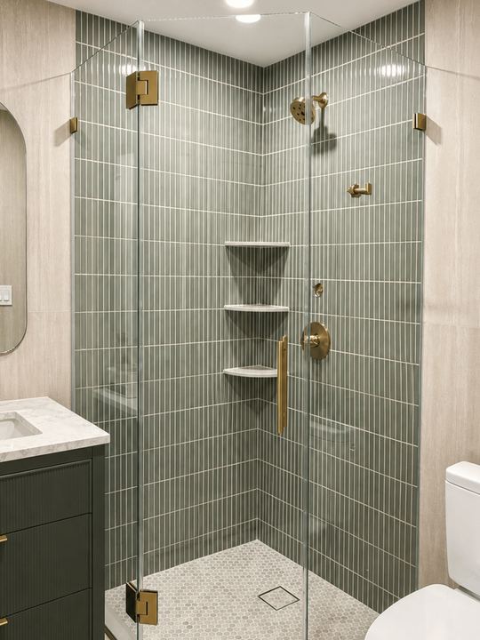 Neo angle enclosure with brass hardware