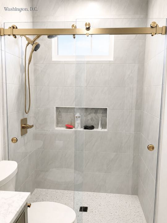Frameless sliding shower door